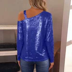 Back view of a sparkling royal blue sequined off-shoulder long-sleeve top for women