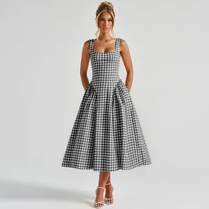 Elegant French style black and white gingham midi dress with flared skirt and square neck