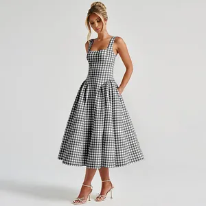 Elegant black and white gingham midi dress with square neckline and pleated flared skirt