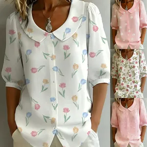 Detail showing multiple floral print variants of women's doll collar short sleeve blouse