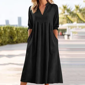 Abito midi in cotone e lino nero con scollo a V e comode tasche laterali da donna