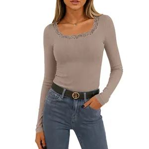 Detail of elegant square neck long sleeve ribbed top with delicate lace trim detail