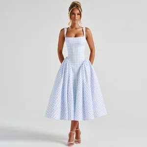 Full view of a French style blue gingham midi dress with a waisted princess cut
