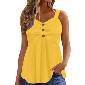 Detailed view of a yellow summer tank top with thick straps and decorative buttons