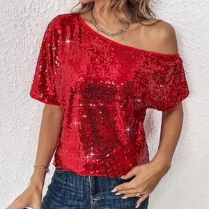 Detailed view of women's sparkly red sequin one-shoulder top with shimmering textures.