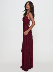 Side view of burgundy maxi dress showing backless lace-up detail and floral texture