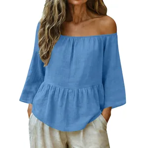 Elegante top blu con spalle scoperte in cotone e lino con orlo a balze