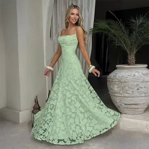 Full view of elegant light green floral lace maxi dress with spaghetti straps and cowl neck