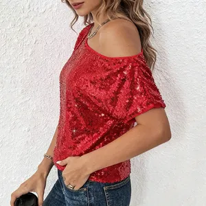 Detailed view of women's sparkling red sequined off-shoulder top with high-shine texture