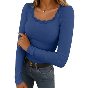 Close-up of blue square neck long sleeve top with elegant lace trim detail
