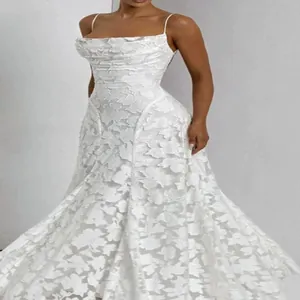Detailed view of elegant white floral lace strap maxi dress with slim fit
