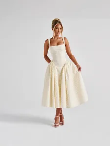 Elegant French style yellow gingham print midi dress with square neck and pleated skirt
