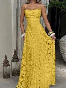 Elegant yellow floral textured strap maxi dress perfect for summer vacation resort style