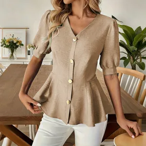 Detail view of a khaki V-neck puff sleeve peplum shirt with elegant linen-style texture