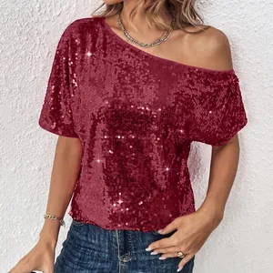 Close-up view of a plus-size red sequined off-shoulder top with short sleeves.