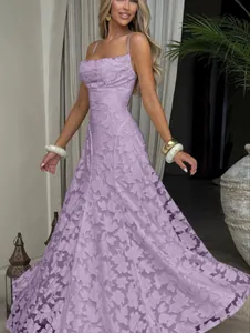 Detailed view of lavender floral textured spaghetti strap maxi dress on model