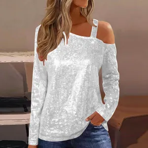 Detailed view of shimmering white sequin cold-shoulder long sleeve top for women
