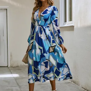Detailed full-length view of a Bohemian deep V-neck blue geometric print midi dress.