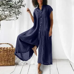 Dunkelblauer Leinen-Jumpsuit mit weitem Bein und Knopfleiste für einen lockeren Sommer-Look