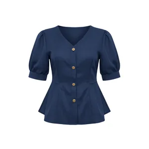 Detailed front view of navy blue V-neck puff sleeve blouse with gold buttons and peplum hem