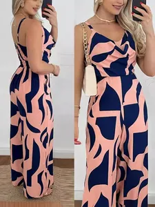 Stylish women's wide-leg jumpsuit with pink and navy abstract print and cowl neck
