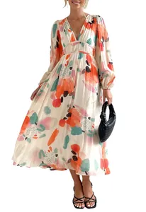 Detail of bohemian deep V-neck maxi dress with abstract colorful print and high waist