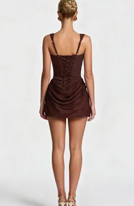 Detailed back view of a chocolate brown corset mini dress with lace-up back and elegant drapes.