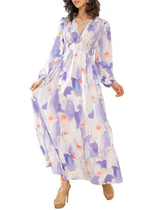 Detail view of Bohemian long-sleeved maxi dress with deep V-neck and purple floral print
