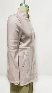 Close-up side view of a slim-fit pink jacquard thickened woolen coat on mannequin