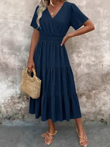 Robe longue bleu marine élégante à col en V, jupe à volants et taille élastique