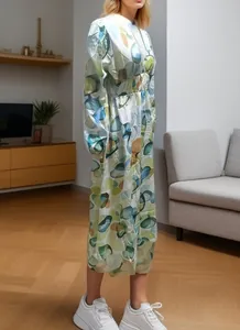 Detail of a bohemian long sleeve midi dress with abstract geometric print and high waist