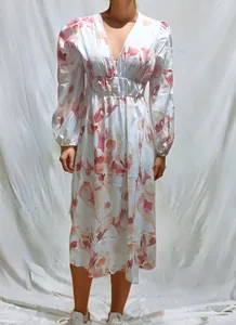Full view of bohemian floral midi dress featuring deep V-neck and elegant high waist line