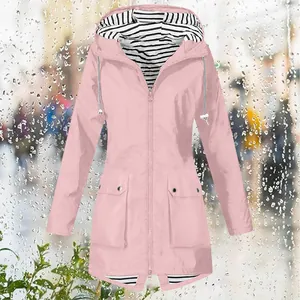 Fashionable women's pink hooded windbreaker with striped lining and front pockets