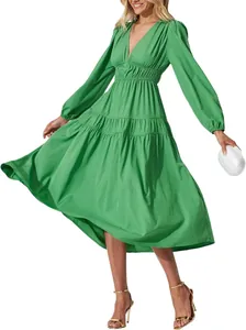 Elegant green deep V-neck midi dress with tiered skirt and elastic high waist detail
