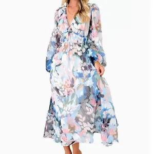 Full view of a bohemian floral print maxi dress featuring a deep V-neck and long sleeves