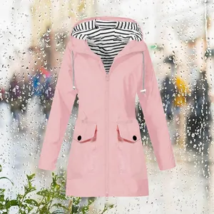 Waterproof women's pink hooded jacket with a stylish black and white striped lining.