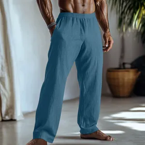 Vista dettagliata dei pantaloni casual traspiranti in cotone e lino blu da uomo con tasche