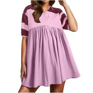 Detailed view of women's casual pink and burgundy striped short-sleeve polo collar dress