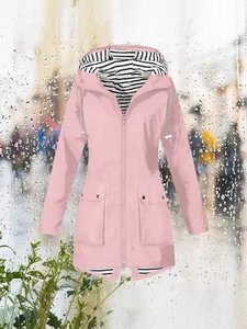 Pink waterproof women's outdoor hooded windbreaker jacket with striped lining detail