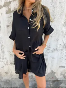 Casual black 2-piece cotton linen set featuring long-sleeve shirt and matching shorts.