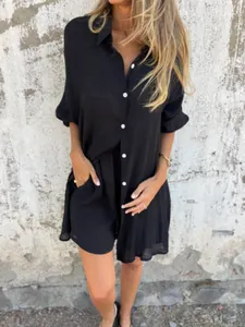 Detailed view of a black cotton linen two-piece set featuring crinkled texture shirt.