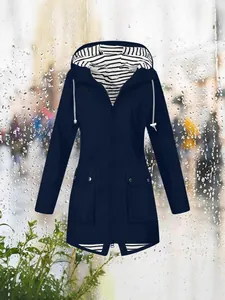Women's navy blue hooded outdoor jacket with striped lining and zipper closure