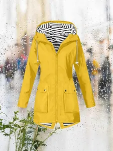Stylish yellow waterproof hooded raincoat with striped lining for outdoor women