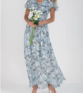 Detail of a light blue chiffon floral maxi dress with ruffle sleeves and V-neckline.