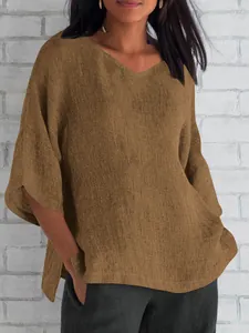 Blusa holgada de algodón y lino con cuello en V en color marrón liso y medias mangas