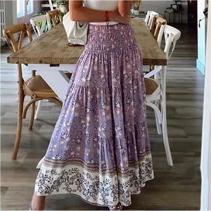 Detailed view of women's bohemian purple floral maxi skirt with smocked high waist