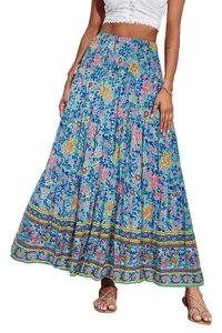 Bohemian high-waisted floral maxi skirt with smocked waist and tiered swing design.