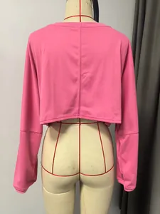 Detailed back view of a pink cropped long-sleeve crewneck sweatshirt for women