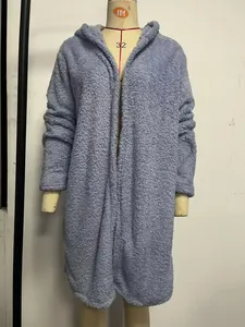 Close-up of a plush lavender-blue hooded open cardigan displayed on a female mannequin.