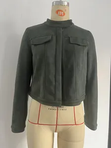 Close-up of a women's dark grey cropped suede jacket with a stand collar and flap pockets.
